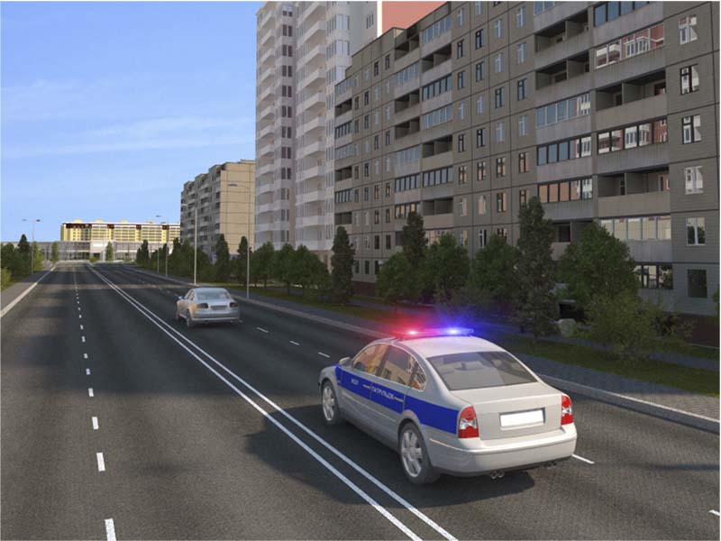 Көк түсті жарқылдауық маягі қосылған автомобиль жақындаған кезде жеңіл…